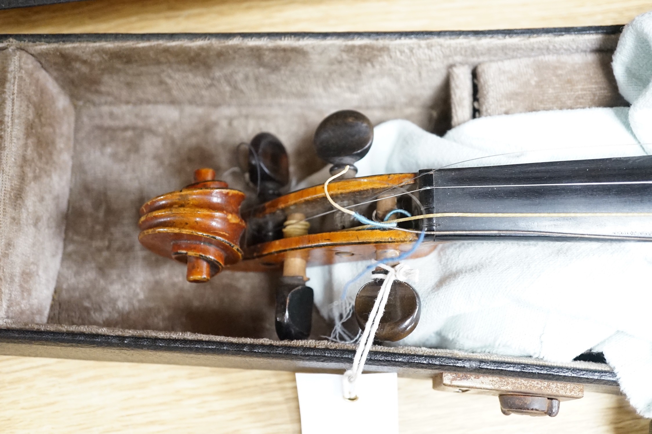 A 19th century French Grandjon school violin, labelled Joseph Guarnerins fecit Cremonae anno 1719 IHS, length of back 35.5 cm (14in.), cased